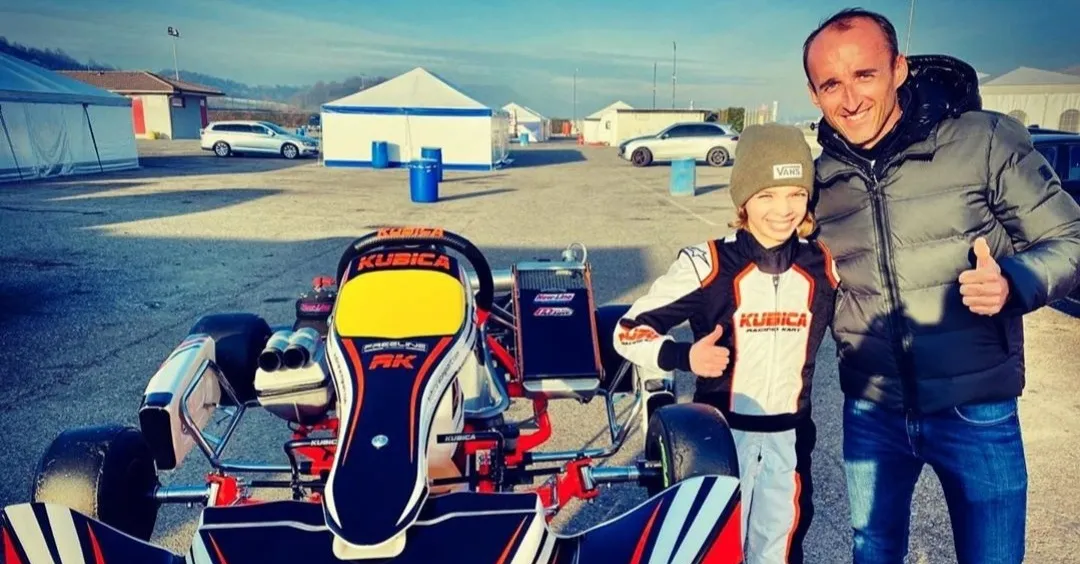 Tymek Kucharczyk i Robert Kubica przy gokarcie Kubica Kart